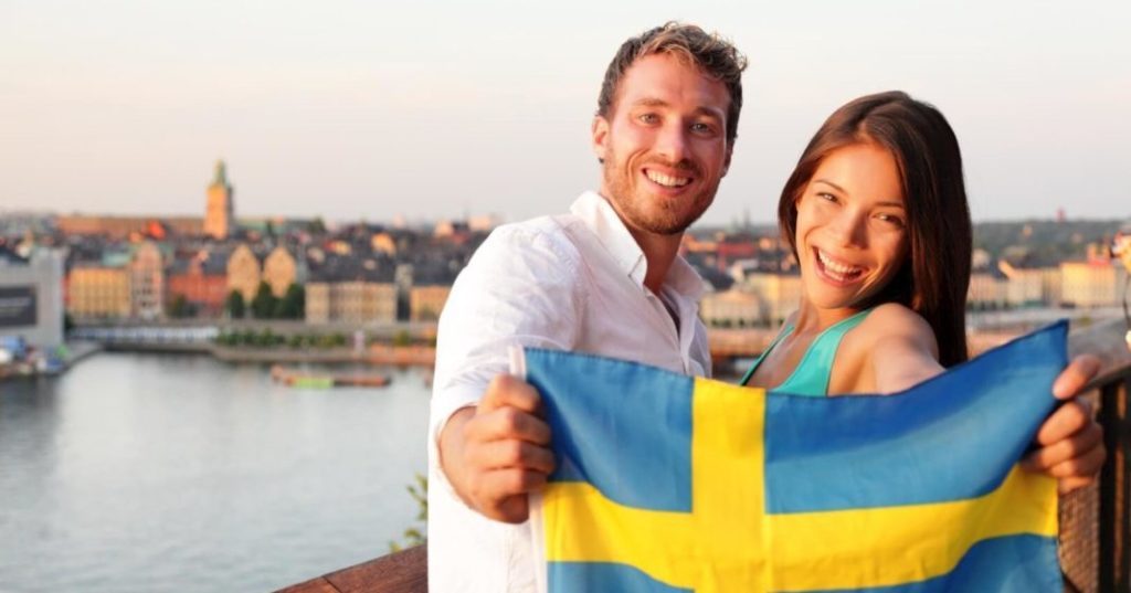 Pärchen mit Schwedenflagge